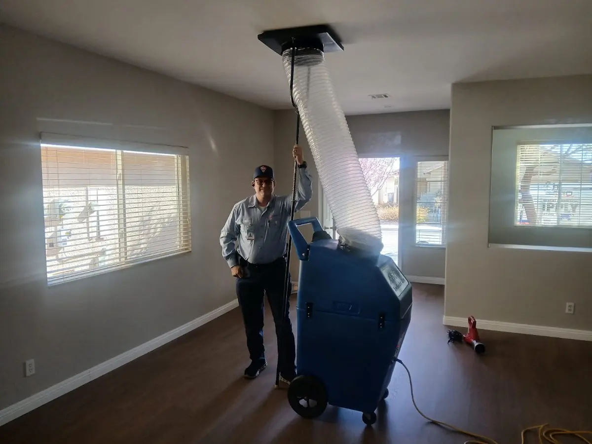 Professional Dryer Vent Cleaning work inside a Sharon home